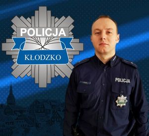 sylwetka policjanta i logo policji